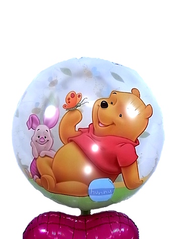 お花にかこまれたプーさんに胸キュン♡